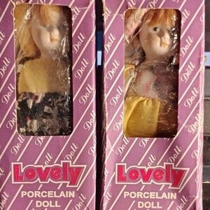 Lovely Porcelain Dolls - Set of Two